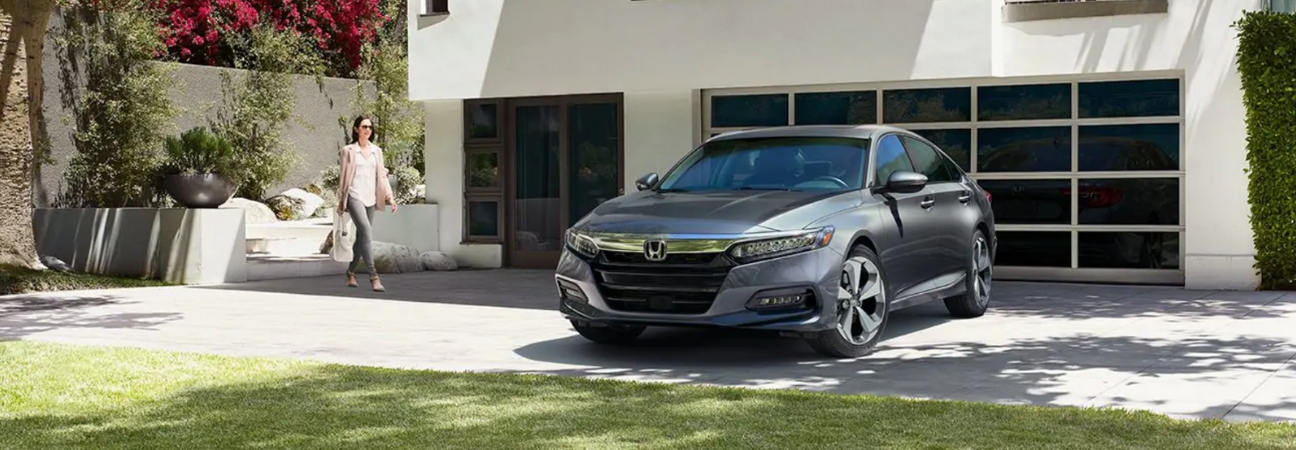 Honda Accord parked outside home